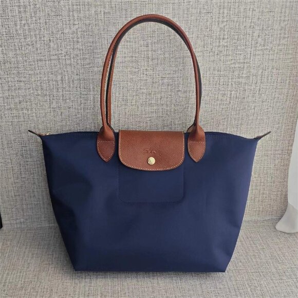 Longchamp Handbags - LONGCHAMP NWT Navy Blue Medium Canvas and Leather Tote Bag